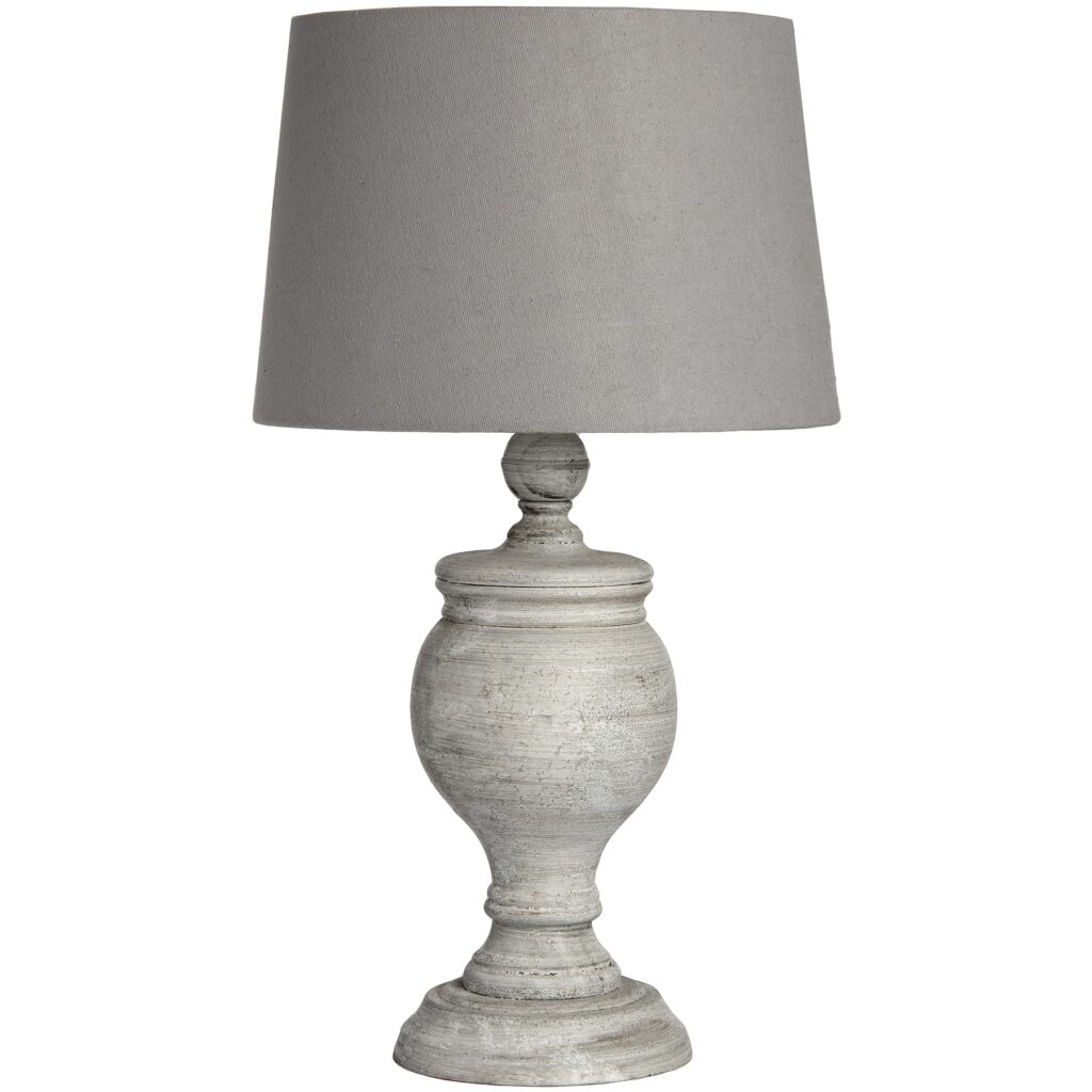Stone effect table lamp with grey linen shade.