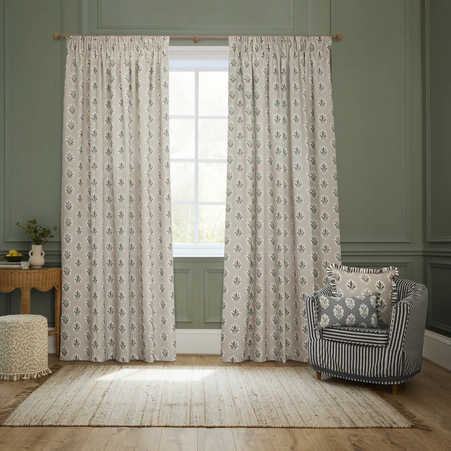 A pair of curtains in sanderson sessile leaf flax