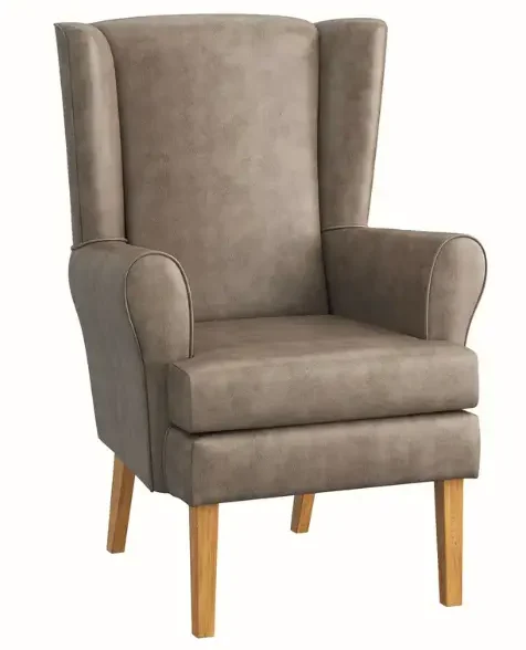 Orthopaedic wing chair covered in beige fabric